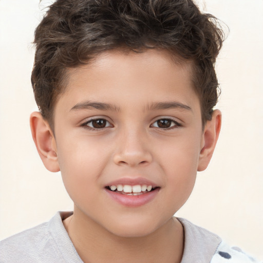 Joyful white child male with short  brown hair and brown eyes