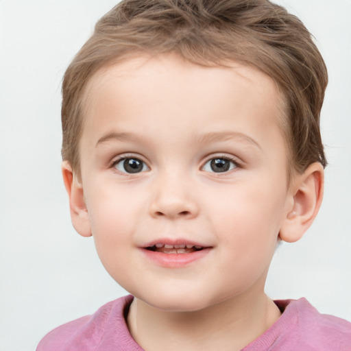 Joyful white child female with short  brown hair and grey eyes