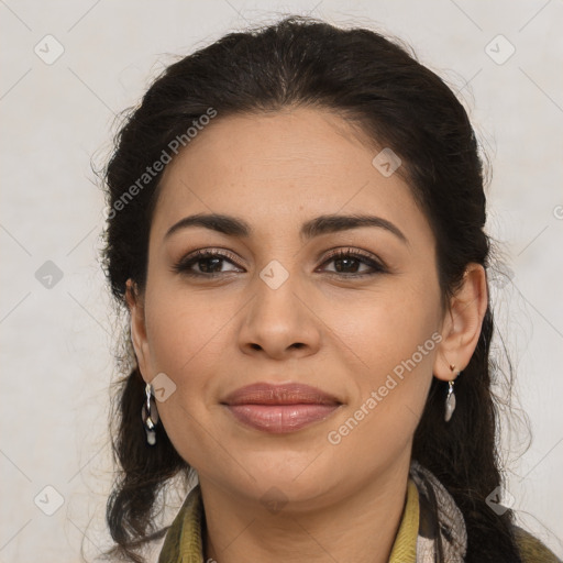 Joyful latino young-adult female with medium  brown hair and brown eyes