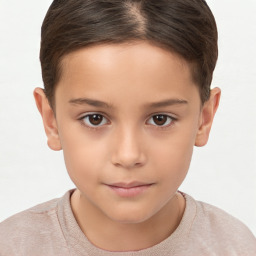 Joyful white child female with short  brown hair and brown eyes