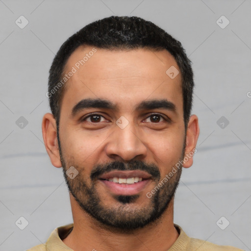 Joyful latino young-adult male with short  black hair and brown eyes