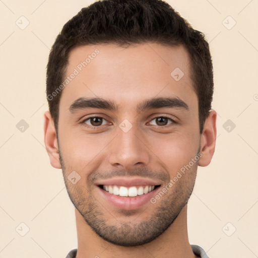 Joyful white young-adult male with short  brown hair and brown eyes