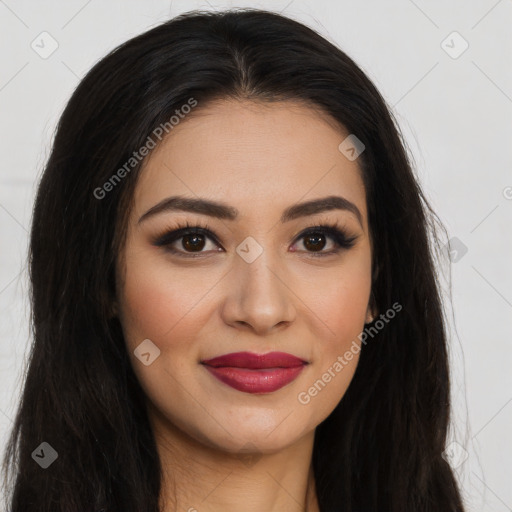 Joyful latino young-adult female with long  brown hair and brown eyes