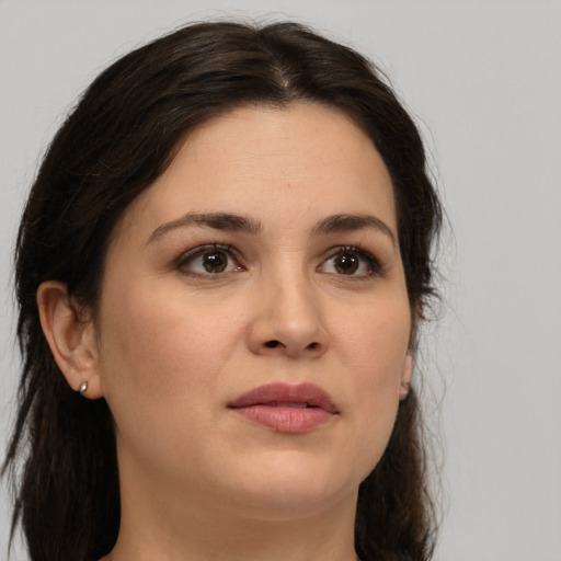 Joyful white young-adult female with medium  brown hair and brown eyes