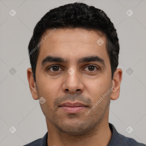 Neutral latino young-adult male with short  black hair and brown eyes