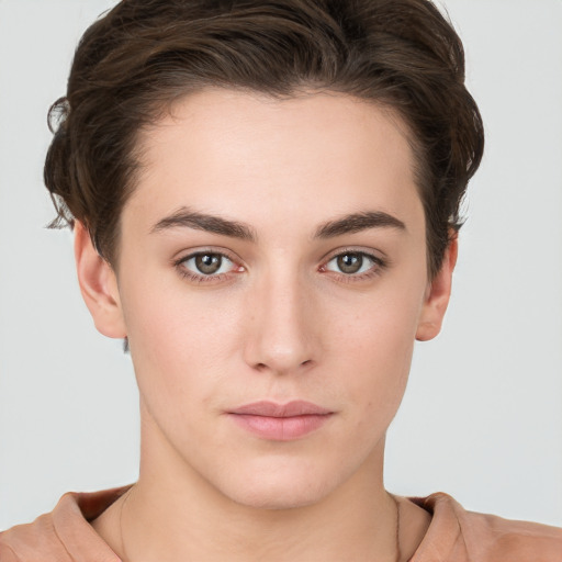 Neutral white young-adult female with short  brown hair and brown eyes