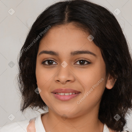 Joyful latino young-adult female with medium  brown hair and brown eyes