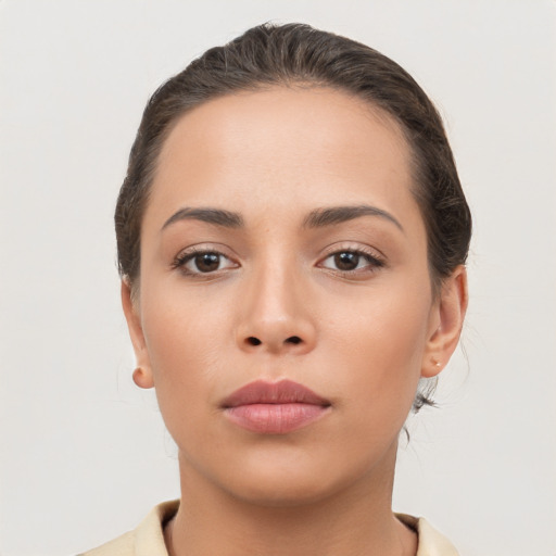 Neutral white young-adult female with short  brown hair and brown eyes