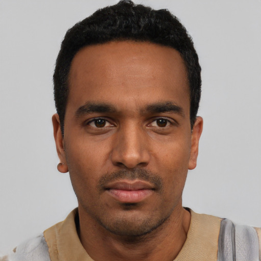 Neutral black young-adult male with short  black hair and brown eyes