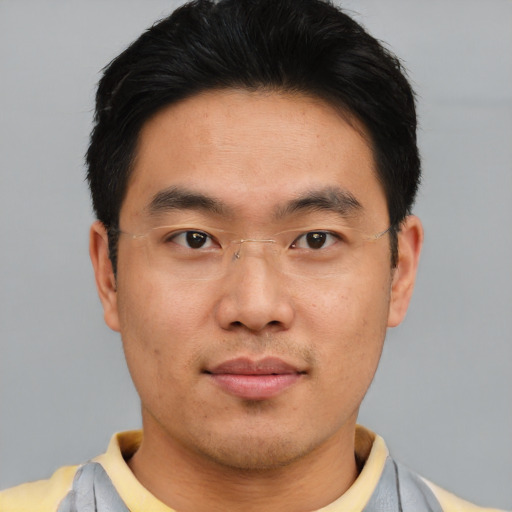 Neutral asian young-adult male with short  brown hair and brown eyes