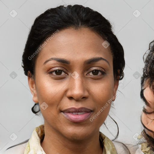 Joyful black young-adult female with medium  brown hair and brown eyes