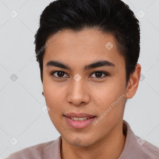 Joyful latino young-adult male with short  brown hair and brown eyes