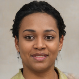 Joyful latino young-adult female with short  brown hair and brown eyes