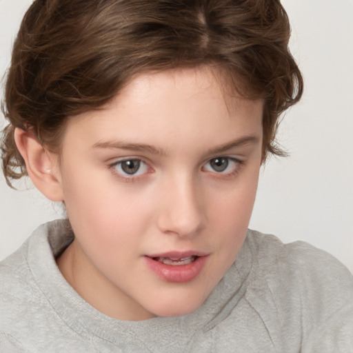 Joyful white child female with medium  brown hair and brown eyes