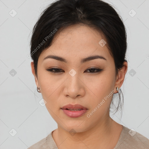 Neutral asian young-adult female with medium  brown hair and brown eyes