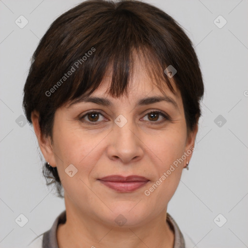 Joyful white adult female with medium  brown hair and brown eyes