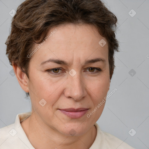 Joyful white adult female with short  brown hair and brown eyes