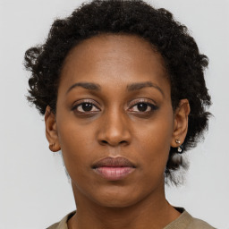 Neutral black young-adult female with short  brown hair and brown eyes