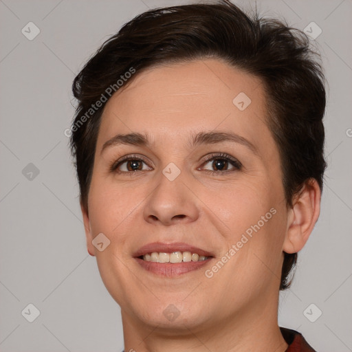 Joyful white young-adult female with short  brown hair and brown eyes