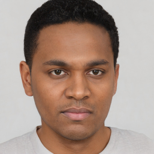 Neutral black young-adult male with short  black hair and brown eyes