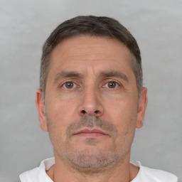 Neutral white adult male with short  brown hair and brown eyes