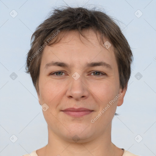 Joyful white adult female with short  brown hair and brown eyes