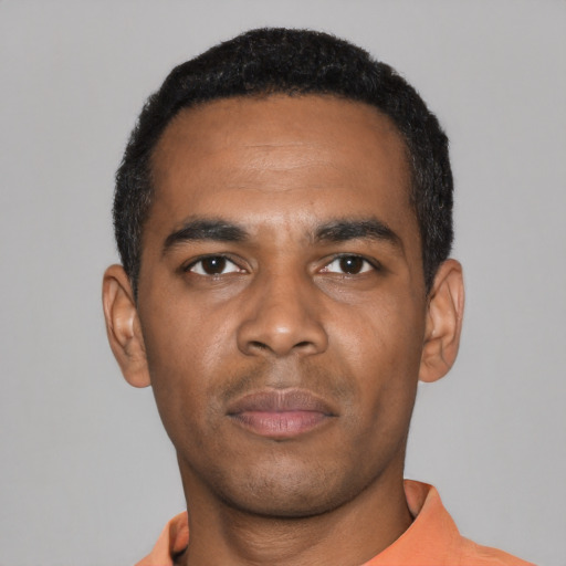 Neutral black young-adult male with short  black hair and brown eyes