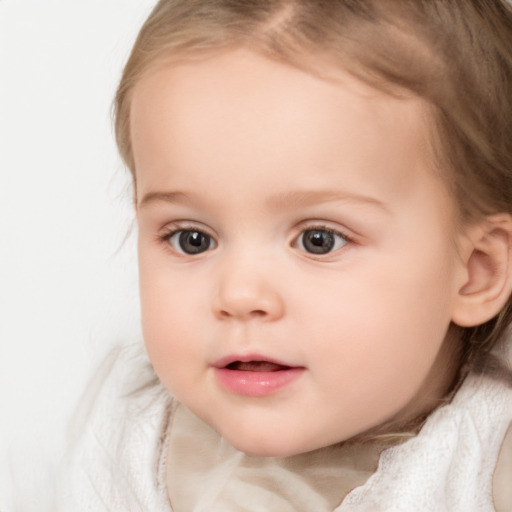 Neutral white child female with medium  brown hair and brown eyes