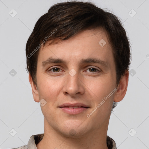 Joyful white young-adult male with short  brown hair and brown eyes