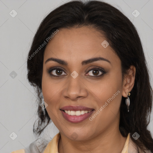 Joyful latino young-adult female with long  brown hair and brown eyes