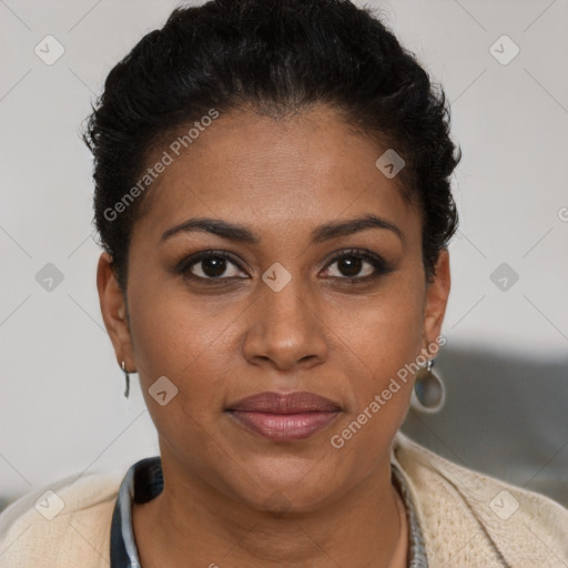 Joyful black young-adult female with short  brown hair and brown eyes