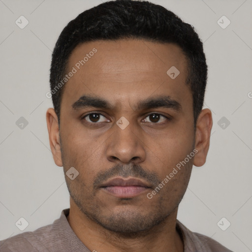 Neutral latino young-adult male with short  black hair and brown eyes