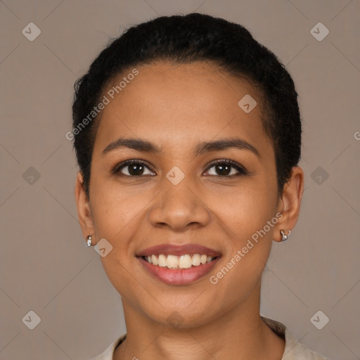 Joyful latino young-adult female with short  black hair and brown eyes