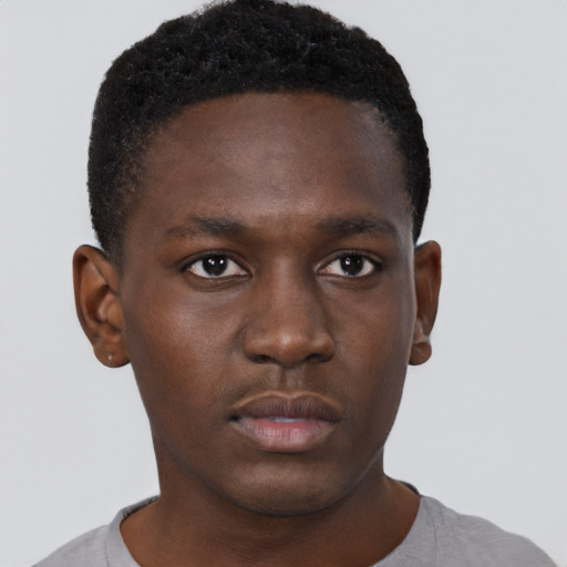 Neutral black young-adult male with short  brown hair and brown eyes