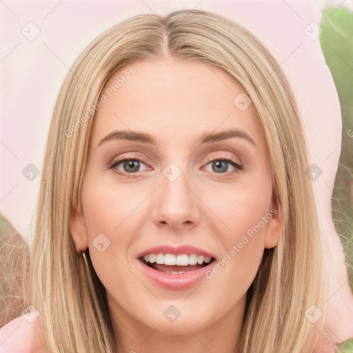 Joyful white young-adult female with long  brown hair and green eyes