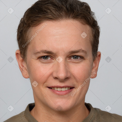 Joyful white adult female with short  brown hair and grey eyes