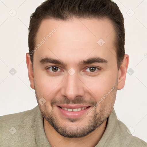 Joyful white young-adult male with short  brown hair and brown eyes