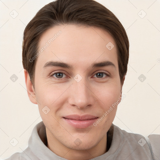 Joyful white young-adult female with short  brown hair and grey eyes