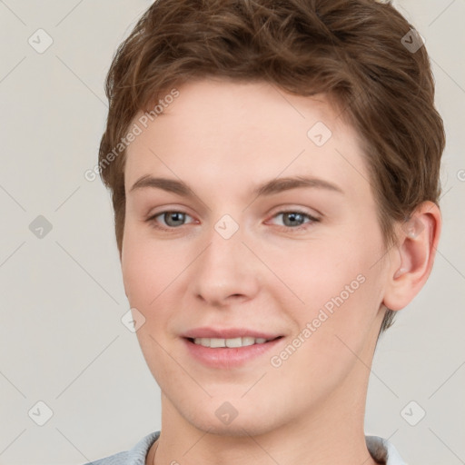 Joyful white young-adult female with short  brown hair and grey eyes