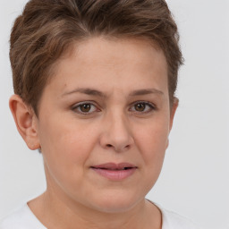 Joyful white adult female with short  brown hair and brown eyes