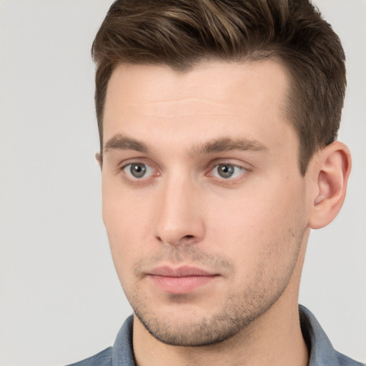 Neutral white young-adult male with short  brown hair and grey eyes