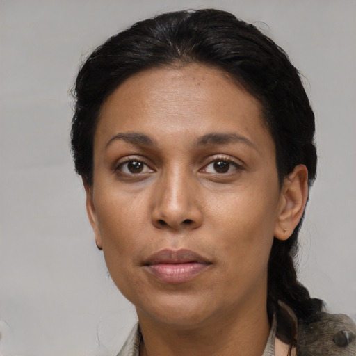 Neutral black young-adult female with short  brown hair and brown eyes