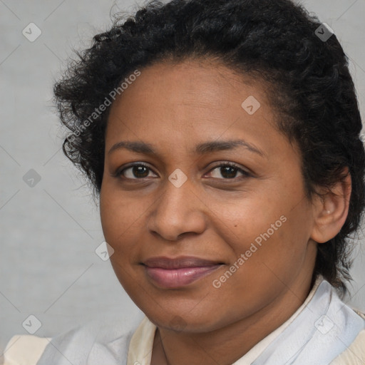 Joyful black adult female with short  brown hair and brown eyes