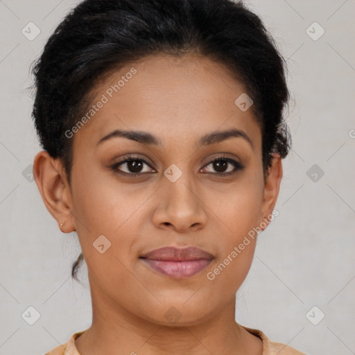 Joyful latino young-adult female with short  brown hair and brown eyes