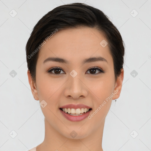 Joyful asian young-adult female with short  brown hair and brown eyes