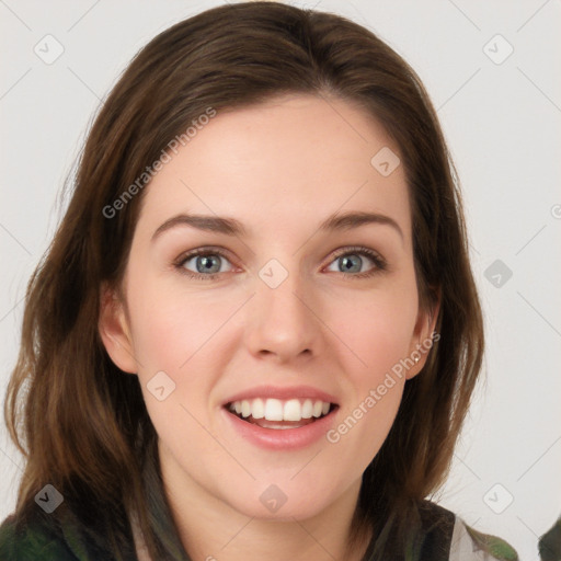 Joyful white young-adult female with long  brown hair and green eyes