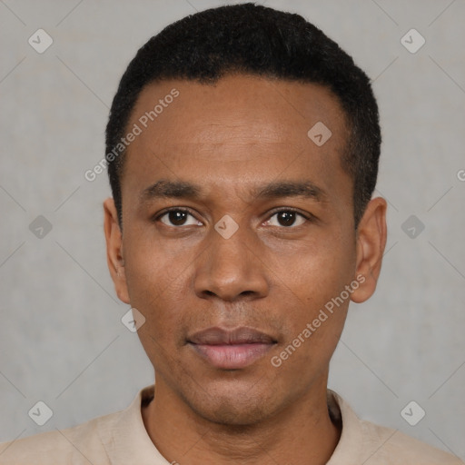 Neutral latino young-adult male with short  black hair and brown eyes