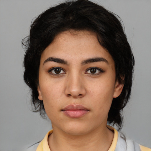 Neutral latino young-adult female with medium  black hair and brown eyes