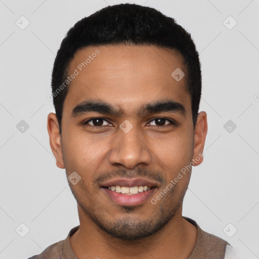 Joyful latino young-adult male with short  black hair and brown eyes