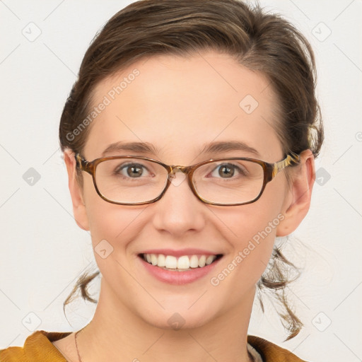 Joyful white young-adult female with medium  brown hair and blue eyes